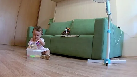 The child plays with plastic fishs Stock Footage 92368523