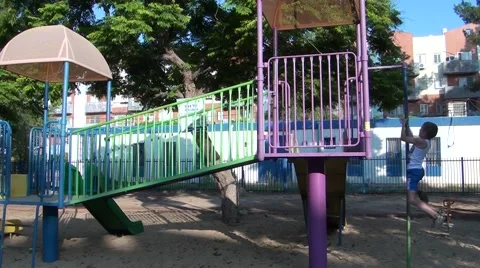 A child plays on the playground Video stock 40014271