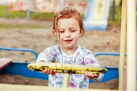 The child plays on the Playground Stock Photos