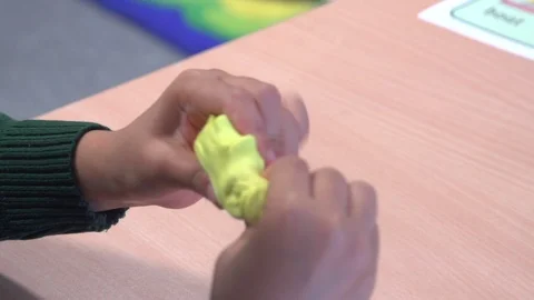 Child plays with putty Stock Footage 103326824