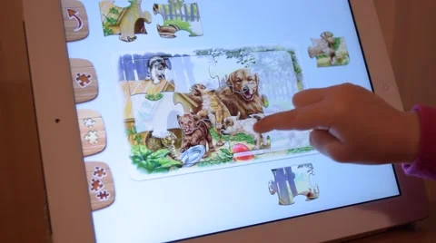 A child plays on the tablet computer, online games Stock-Footage 60223472