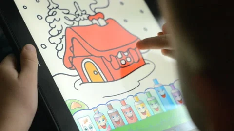 Child plays on the tablet Stock Footage 59663009