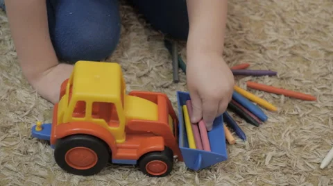 Child plays with a toy Video stock 42320519