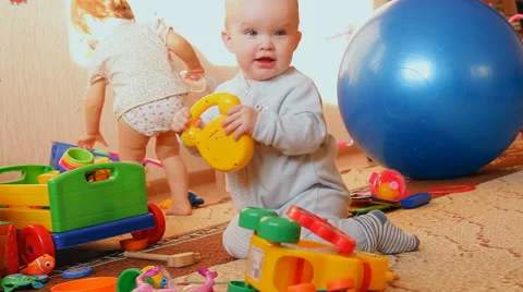 A child plays with toys Stock Footage 46970118