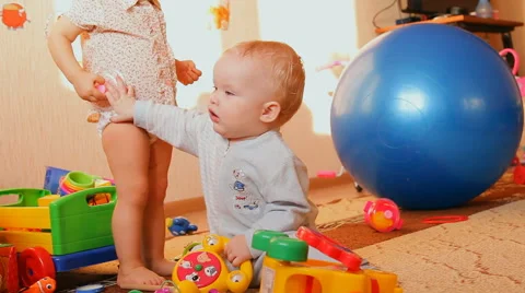 A child plays with toys Stock Footage 46970148