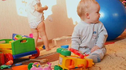 A child plays with toys Stock Footage 46970188