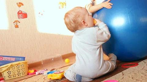 A child plays with toys Stock Footage 46971260