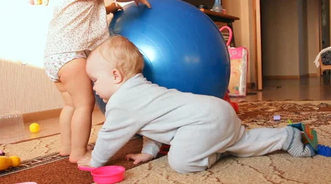 A child plays with toys Stock Footage 46971371