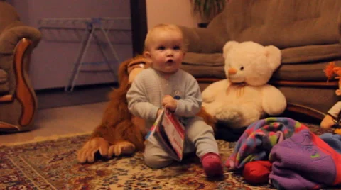 A child plays with toys Stock Footage 47297316