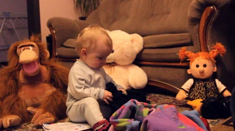 A child plays with toys Stock Footage 47298092