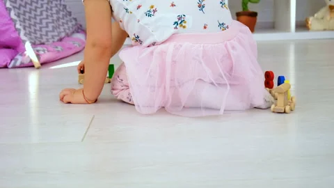 A child plays with a train made of numbers. Selective focus. Stock Footage 234482563
