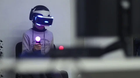 Child plays in virtual reality Stock Footage 81789711