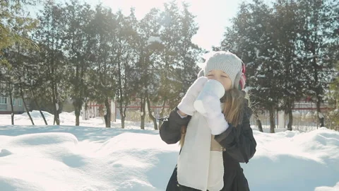 Child plays in the winter Park Stock Footage 88147458