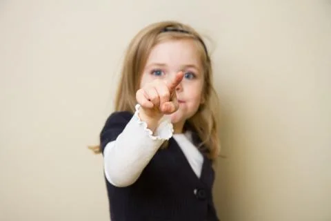 Child pointing at the camera Stock Photos
