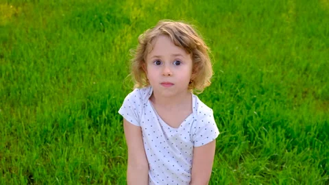 Child pointing forward in nature. Selective focus. Stock Footage 313345230