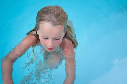 Child in pool Stock Photos