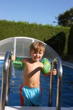 Child in the pool Stock Photos