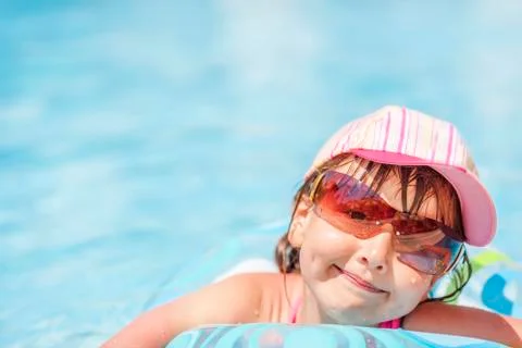 Child in pool Stock Photos
