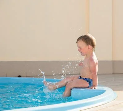 Child in the pool Stock Photos