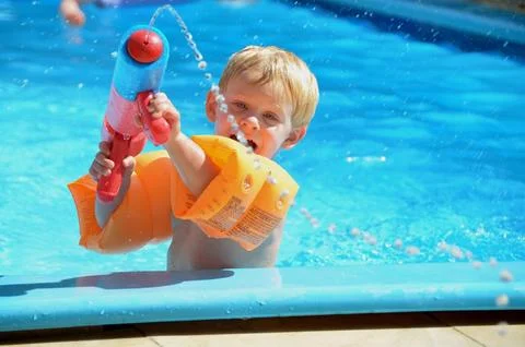 Child in the pool Stock Photos