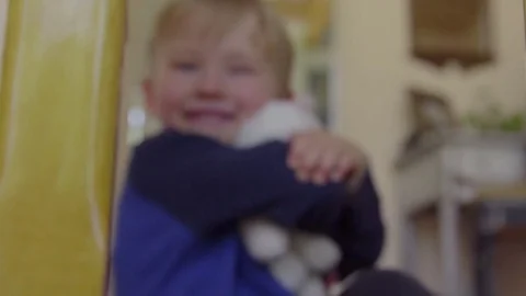 Child poses with toy cat Stock Footage 76285893