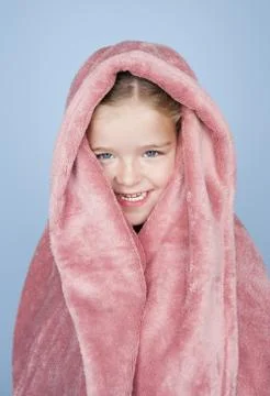 Child posing draped in towel Stock Photos