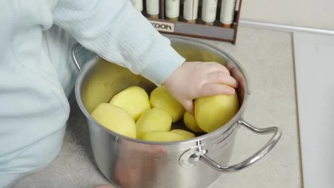 Child with potatoes Stock Footage 271616772