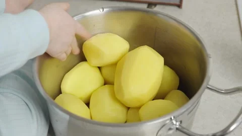 Child with potatoes Stock Footage 271616786