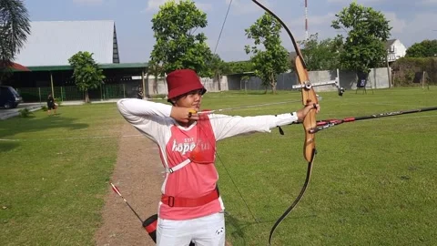 Child is practicing archery Stock Footage 205064223