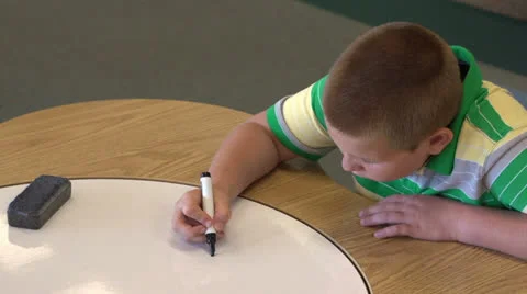 Child practicing simple math Stock Footage 26585001
