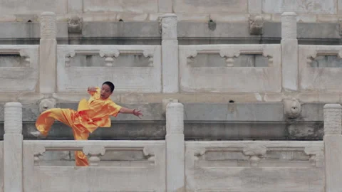 Child practicing Tai Chi in the square of Temple of HeavenIn Beijing.china Stock Footage 141644286