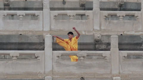 Child practicing Tai Chi in the square of Temple of HeavenIn Beijing.china Stock Footage 141644532