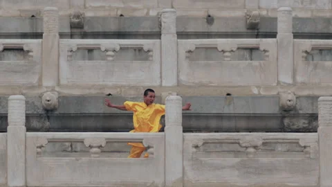 Child practicing Tai Chi in the square of Temple of HeavenIn Beijing.china Stock Footage 141644738