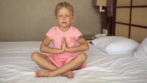 Child practicing yoga Stock Footage 78259513