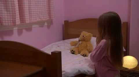 Child praying Stock Footage 22665312