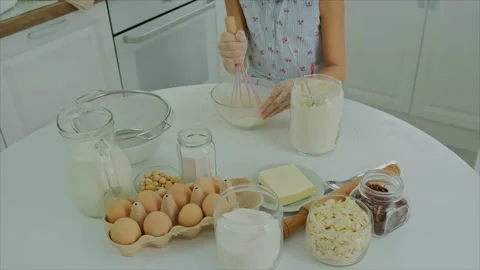 The child prepares the dough in the kitchen. Selective focus. Stock Footage 171471277