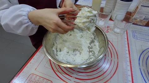 The child is preparing food. Master class for children. Children make ice cream. Stock Footage 299008497