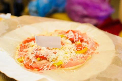 Child preparing pizza in the kitchen Stock Photos