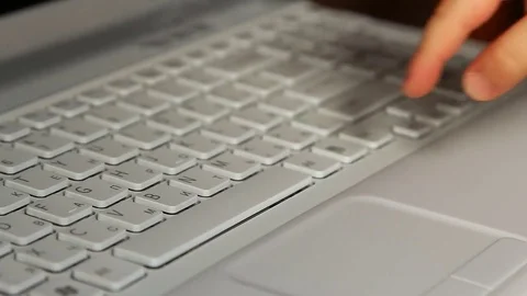 Child presses the keyboard Stock Footage 76372350