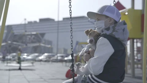 Child in a protective mask  Stock-Footage 141592335