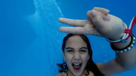 Child pulling down a water slide Stock Footage 119694191
