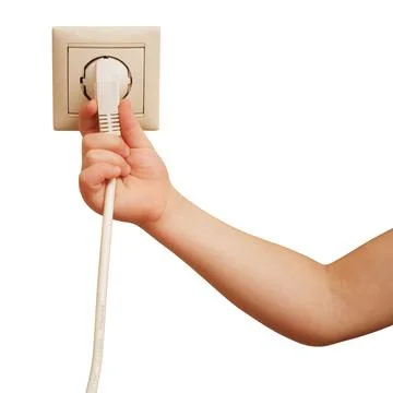 Child pulling electric plug from outlet on white background. Risky behavior a 스톡 사진