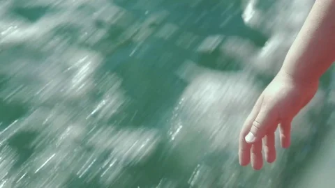 Child pulling hand down from sailing boat Stock Footage 70742821