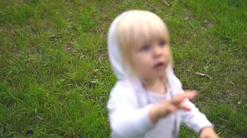 Child pulls his hands to the top. Stock Footage 80832581