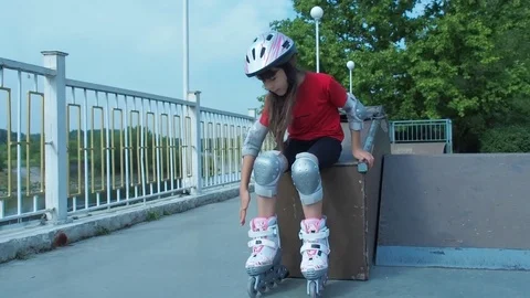 A child is putting on a roller. Stock Footage 79100710
