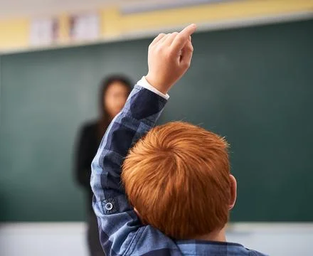 Child, question and student in classroom with question for teacher, education Stock Photos