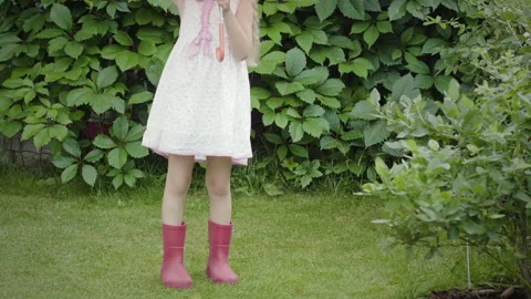 Child in the rain in nature Stock Footage 135016714