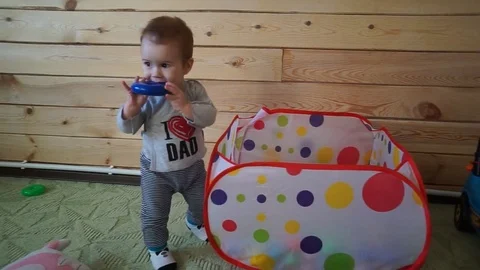 The child reaches for the camera. Stock Footage 74641080