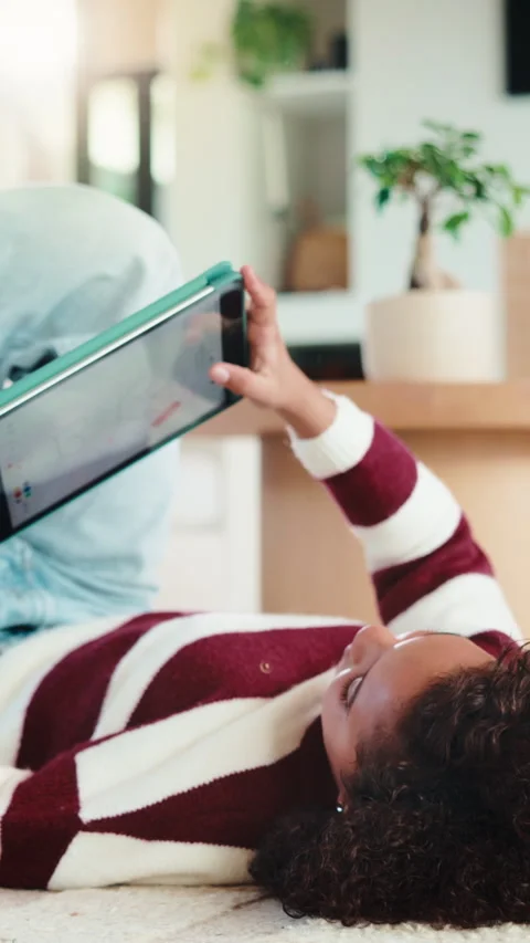 Child, reading and elearning with tablet in home, growth or skill development Stock Footage 335851092
