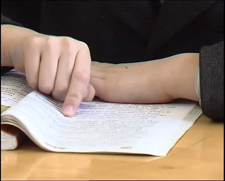 Child reading a book Stock Footage 1050443
